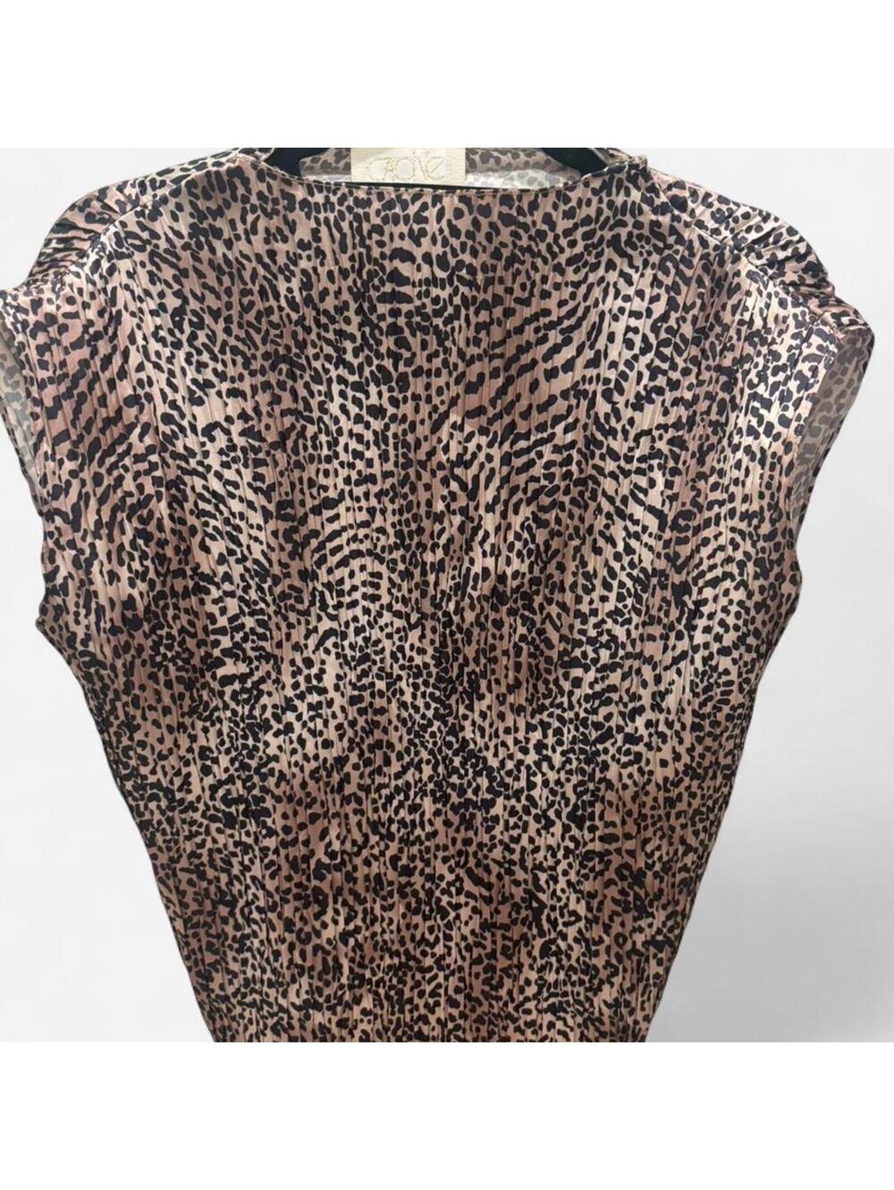 Cache - Animal Print Blouse with Capped Sleeves and stretchy pleats.